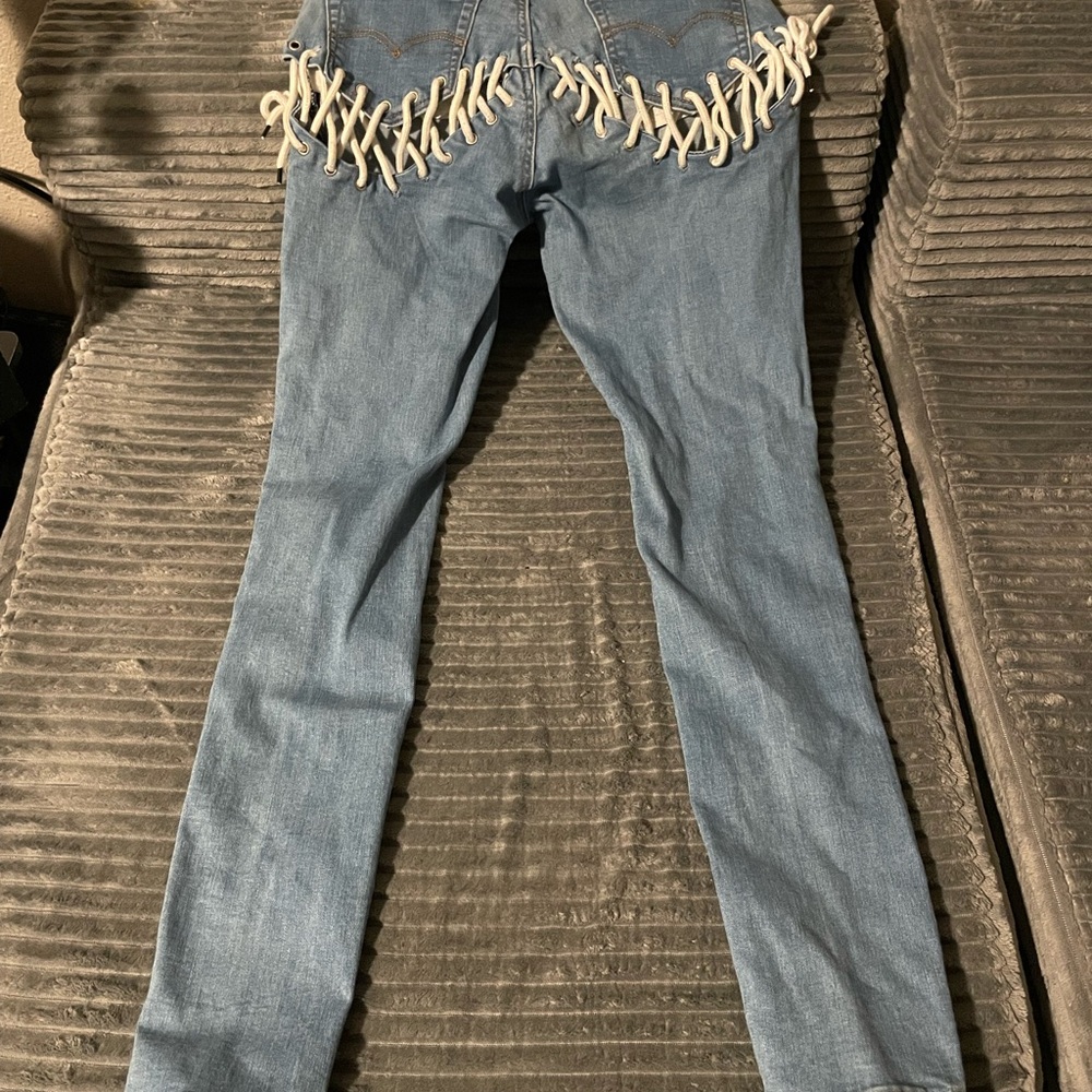 Stylish Blue Jeans with Unique Detailing
